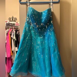 Turquoise Pageant/Homecoming Mirror Sequin Dress originally from Muzzie’s